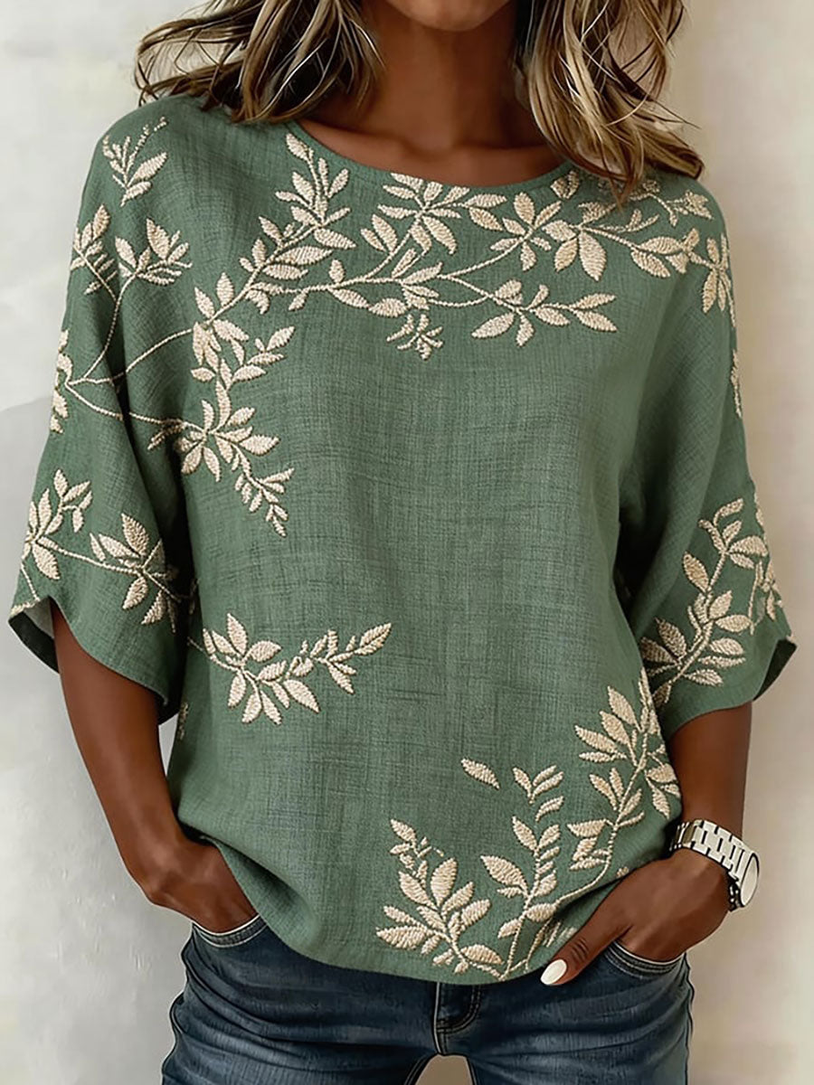 Kvinnlig casual t-shirt i bomull-linne med blommönster