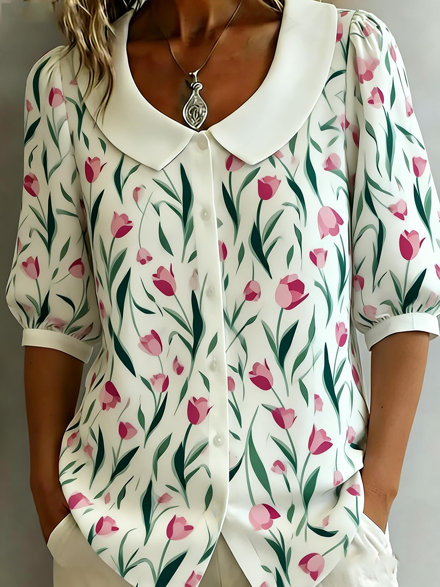 Cotton-linen women's shirt with a floral pattern, elbow-length sleeves, and a Peter Pan collar