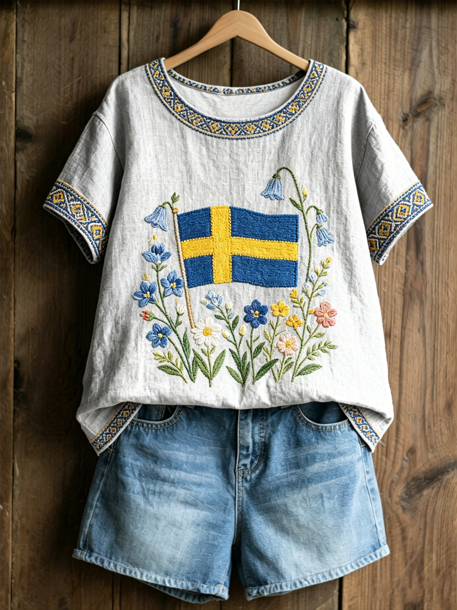 Women's knitted sweater with Swedish text about plants and flowers, relaxed style