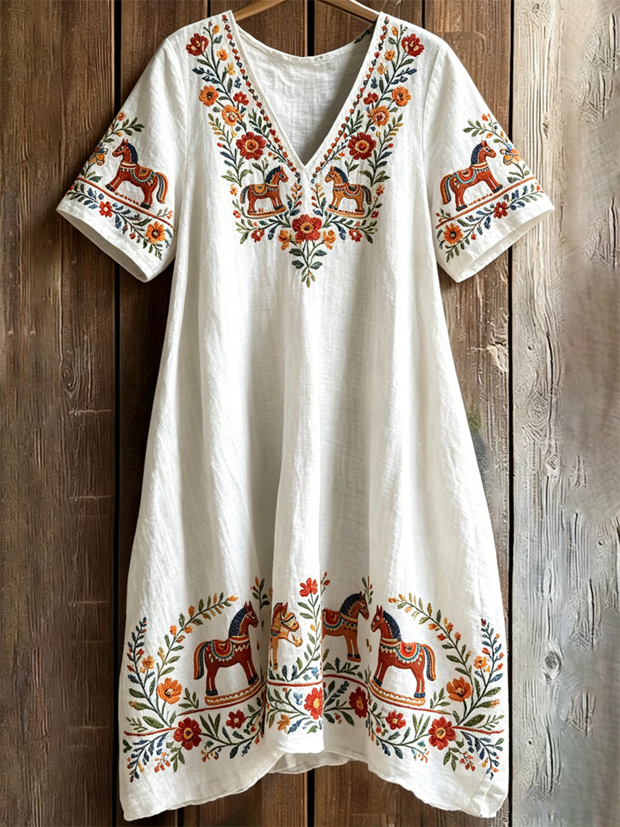 Women's summer dress in Swedish Midsummer style with V-neck and pockets