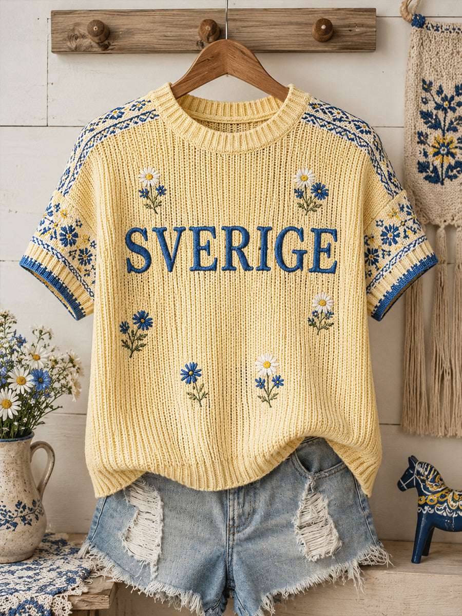 Dammens midsommartröja i stickat tyg med blommönster och korta ärmar
