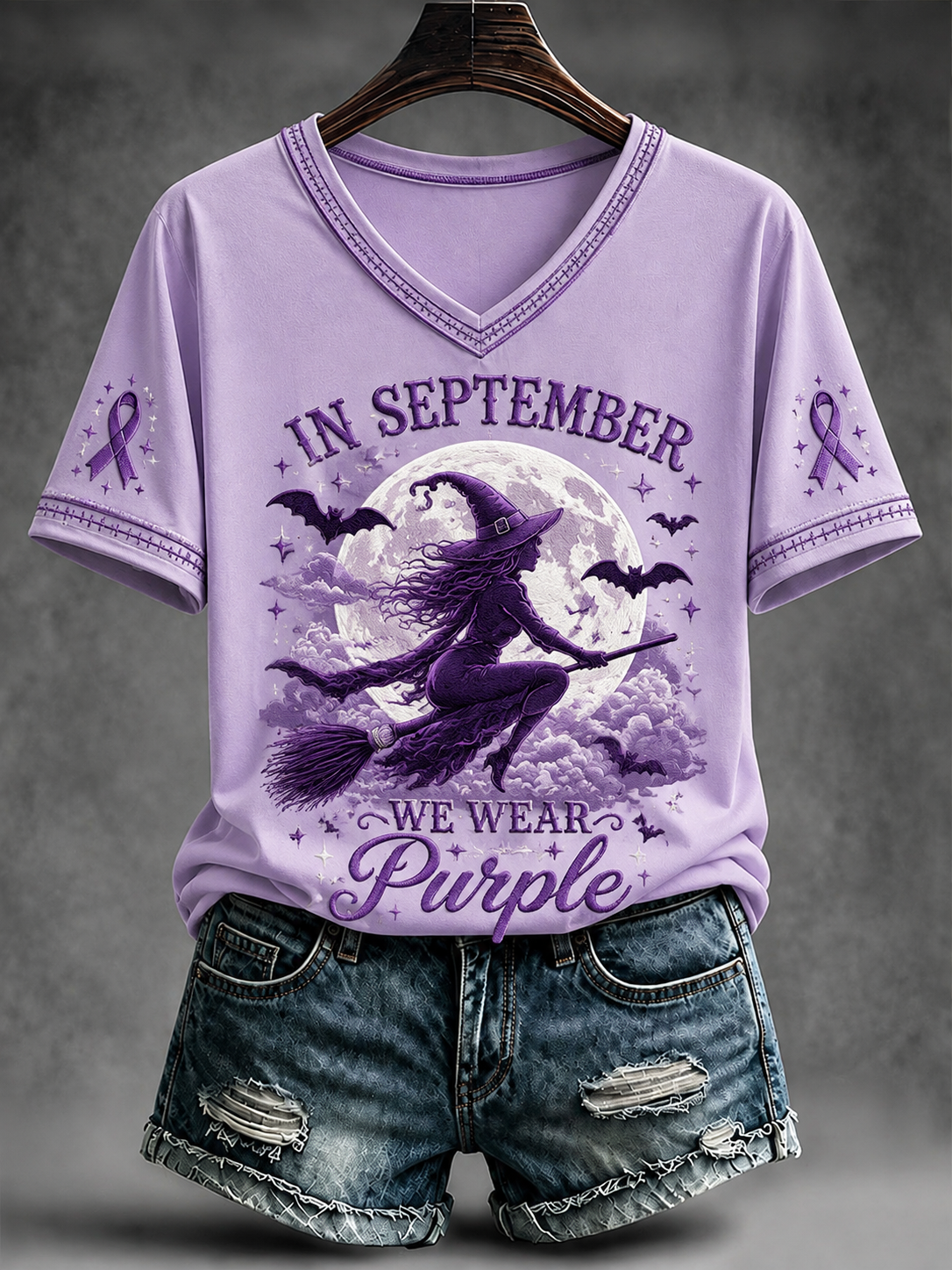 Kvinnors I september bär vi lila T-shirt med korta ärmarna