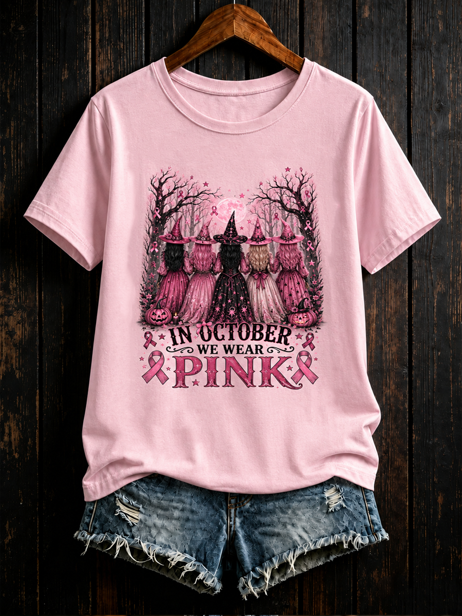 Kvinnor i oktober bär rosa kortärmade t-shirts