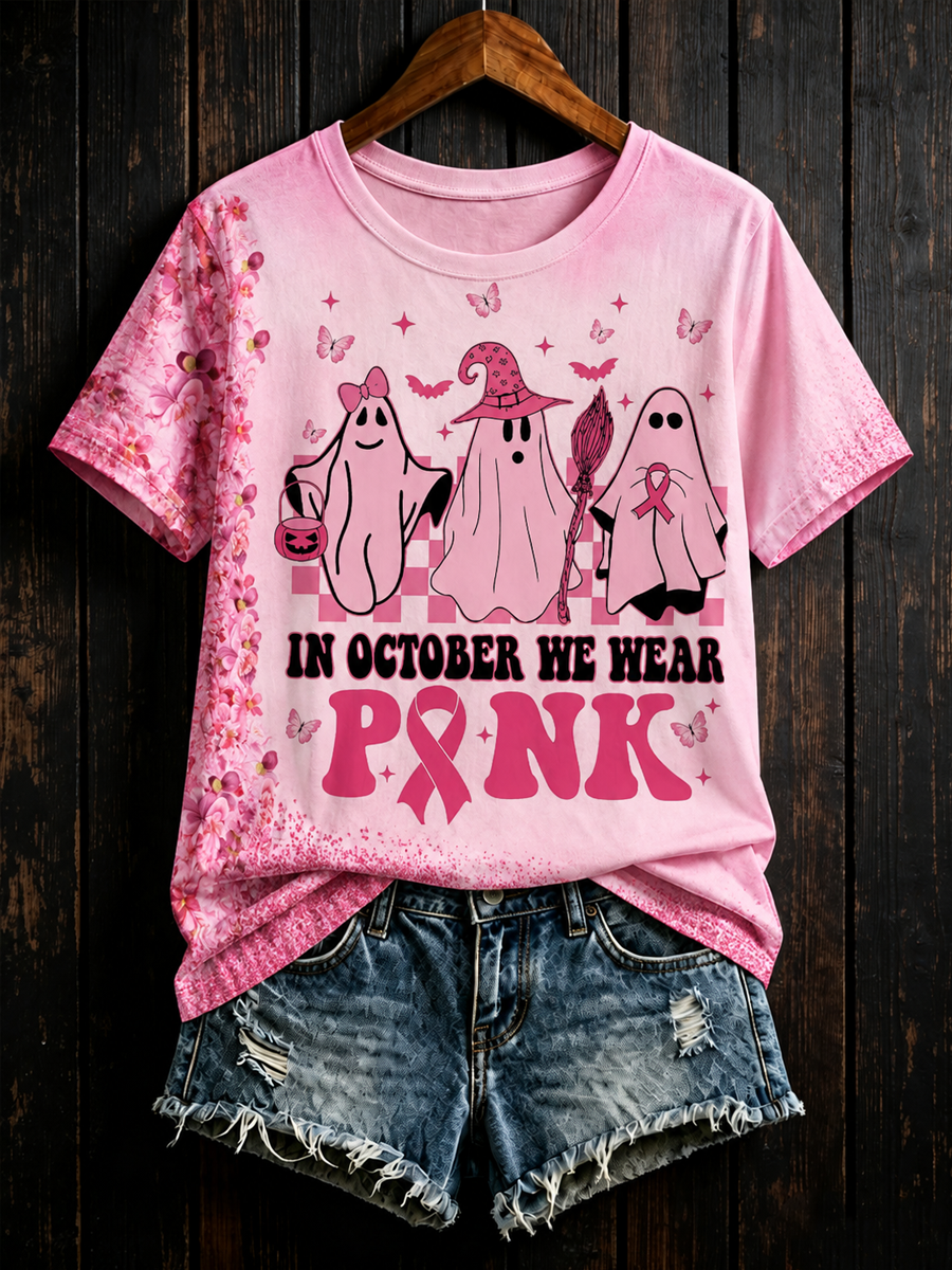 Kvinnor i oktober bär rosa kortärmade t-shirts