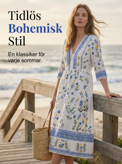 Women's midsummer style V-neck top with an ethnic pattern