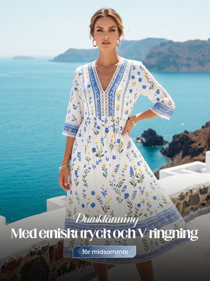 Women's midsummer style V-neck top with an ethnic pattern