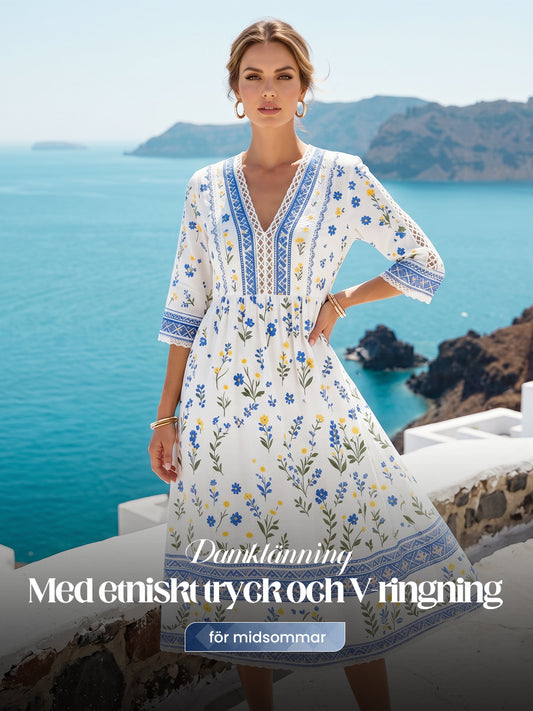Women's midsummer style V-neck top with an ethnic pattern