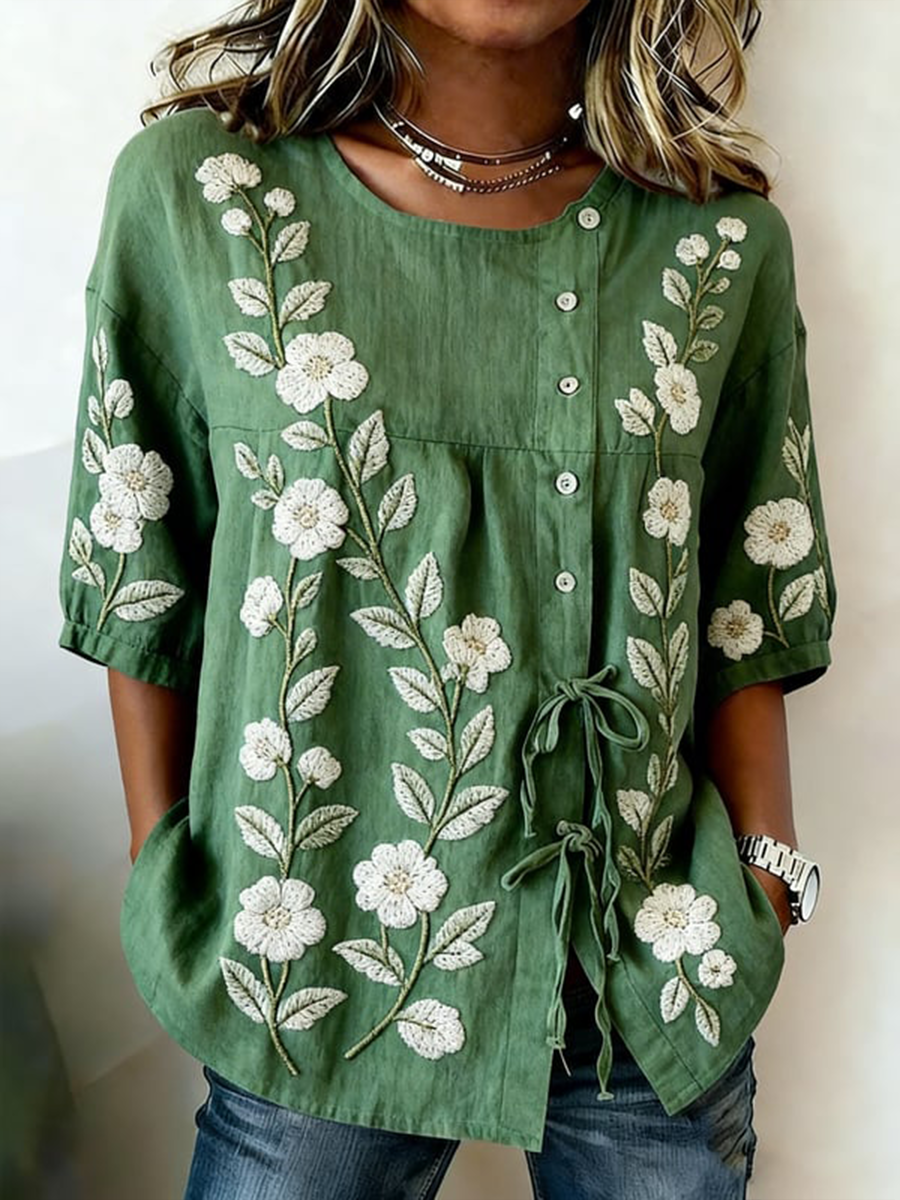 Women's linen blend shirt with buttons and lace, adorned with plants and flowers