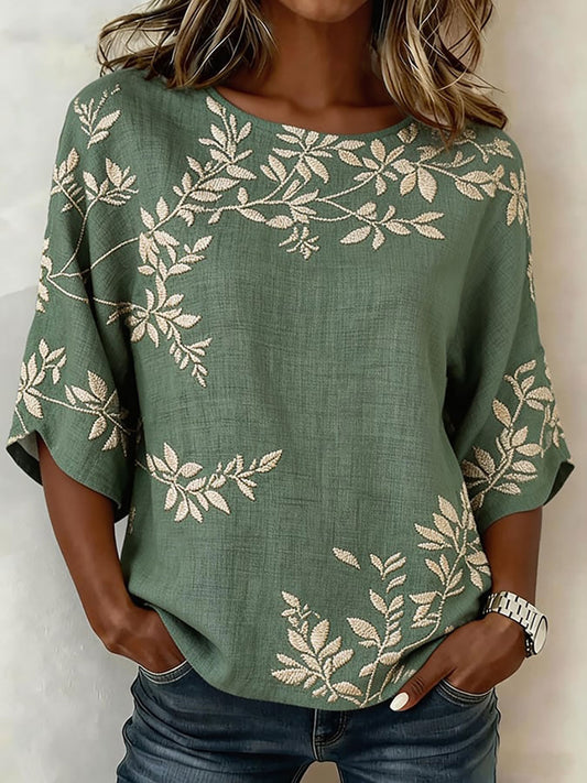 Kvinnlig casual t-shirt i bomull-linne med blommönster