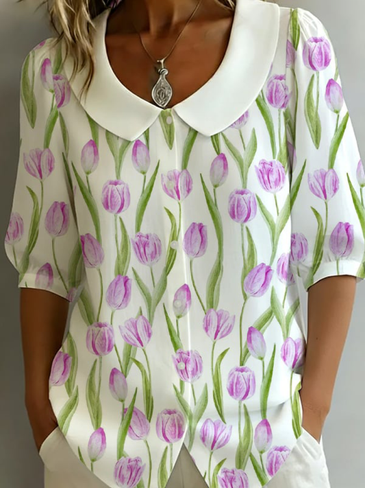 Women's cotton-linen shirt with a floral pattern, elbow-length sleeves, and a Peter Pan collar