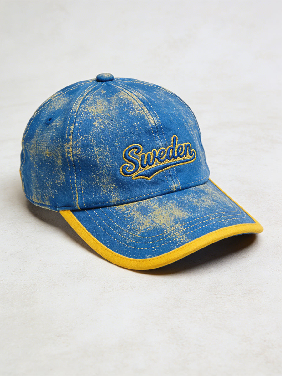 Adorned hat with colour-blocked print