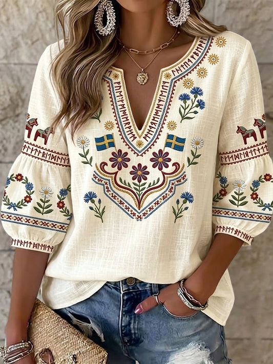 Women's vintage-style blouse from Sweden, symmetrically patterned with flowers and a V-neck