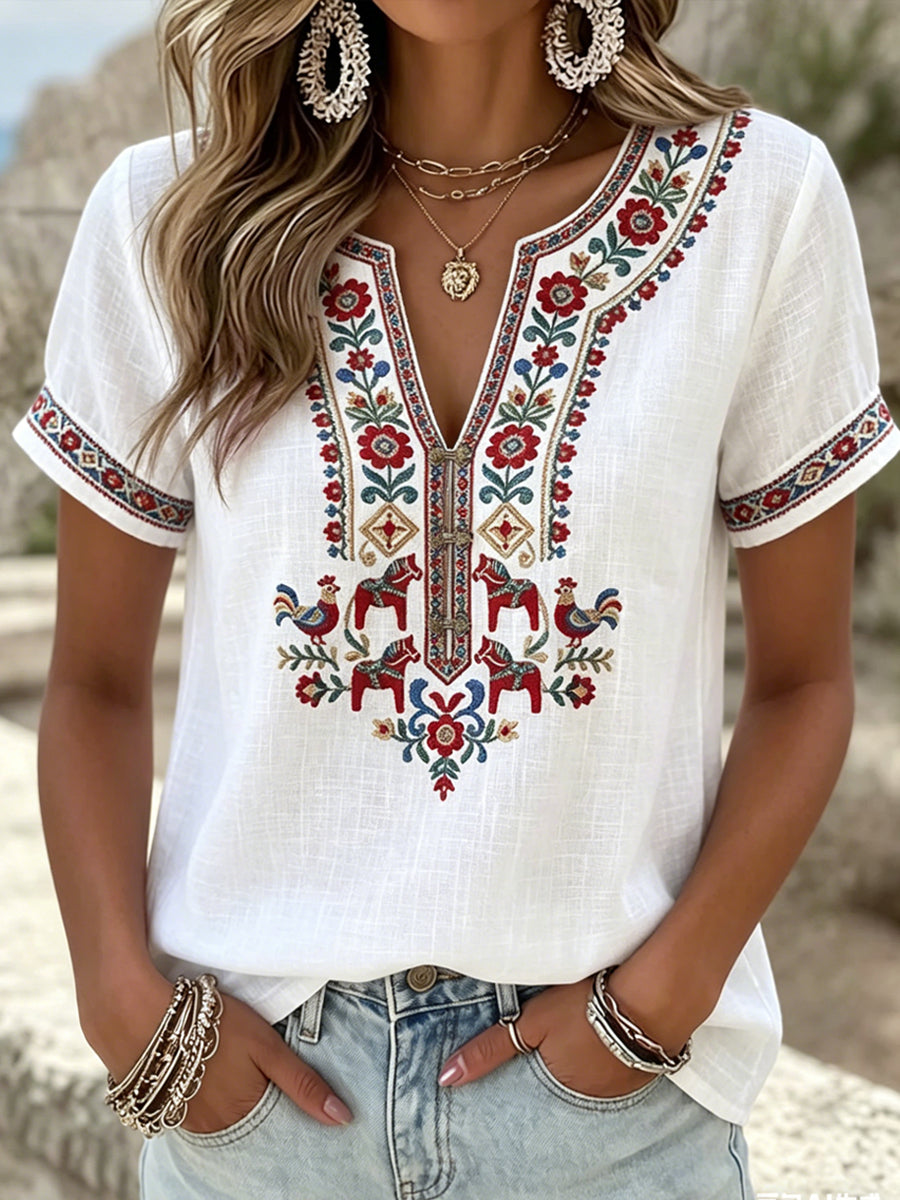 Women's vintage-style T-shirt with symmetrical floral pattern and V-neck