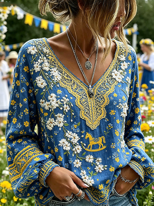 Women's top in midsummer style with ethnic pattern, V-neck, and puff sleeves