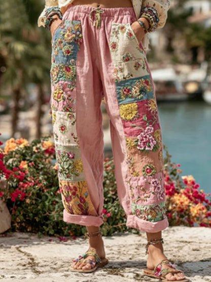 Bohemian-style women's tie with floral embroidery, contrasting colors, and a linen blend – casual trousers
