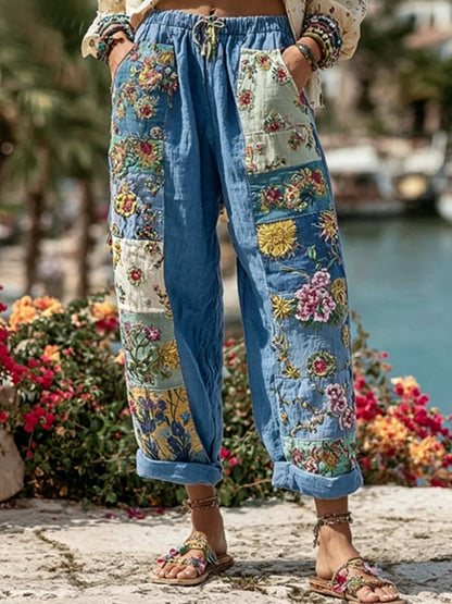 Bohemian-style women's tie with floral embroidery, contrasting colors, and a linen blend – casual trousers