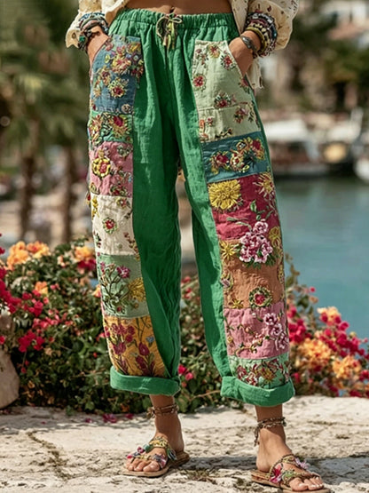 Bohemian-style women's tie with floral embroidery, contrasting colors, and a linen blend – casual trousers
