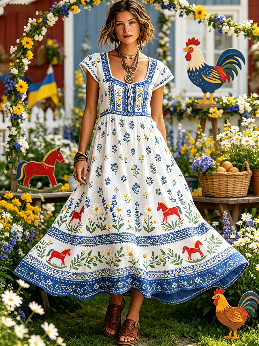 Damsommarklänning med blommönster i pastellstil