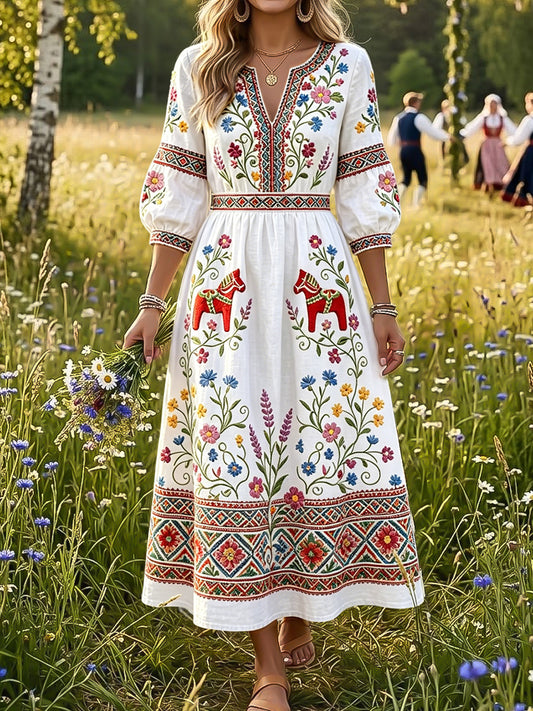 Damskjorta i retrostil med romantisk blomstermönstrad karusellprint och V-ringning