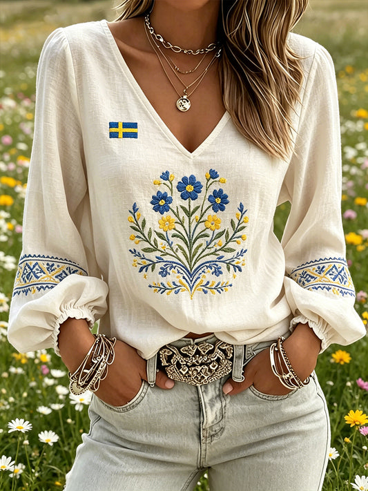 Women's top with midsummer motif, floral pattern, v-neck and puff sleeves