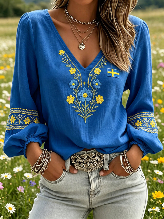 Women's top with midsummer motif, floral pattern, v-neck and puff sleeves