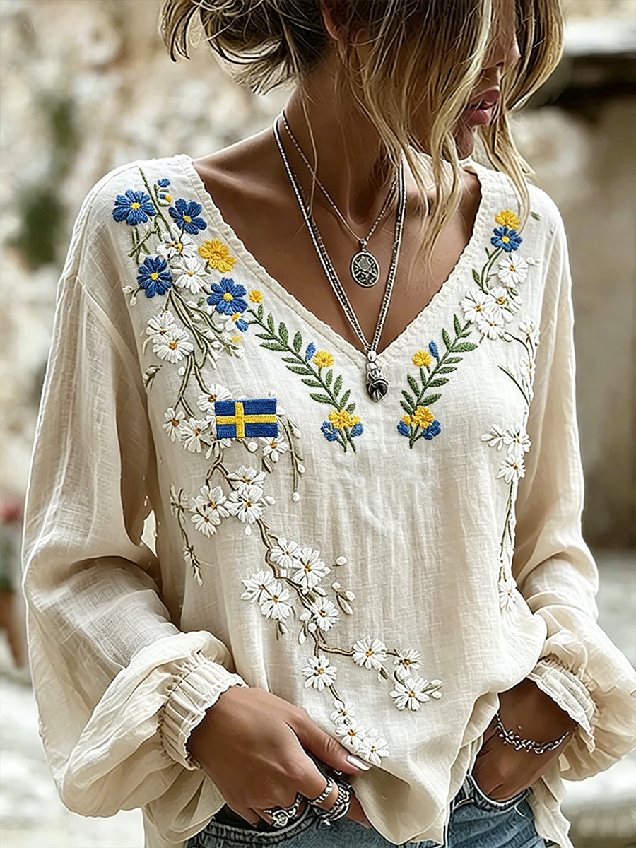 Women's midsummer top in linen blend with floral print and long sleeves