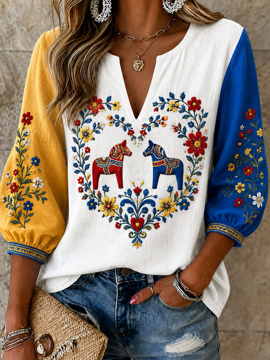 Women's vintage Swedish style blouse with embroidered floral pattern, midsummer art print and a relaxed cotton-linen fit