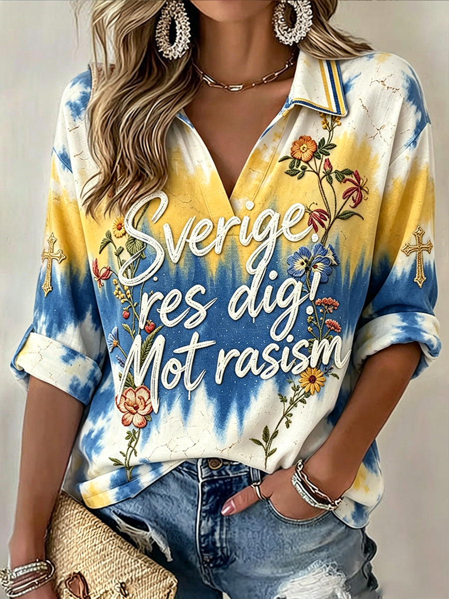 Damsvart antidiskriminerings-polo i casual stil med retroblommönster
