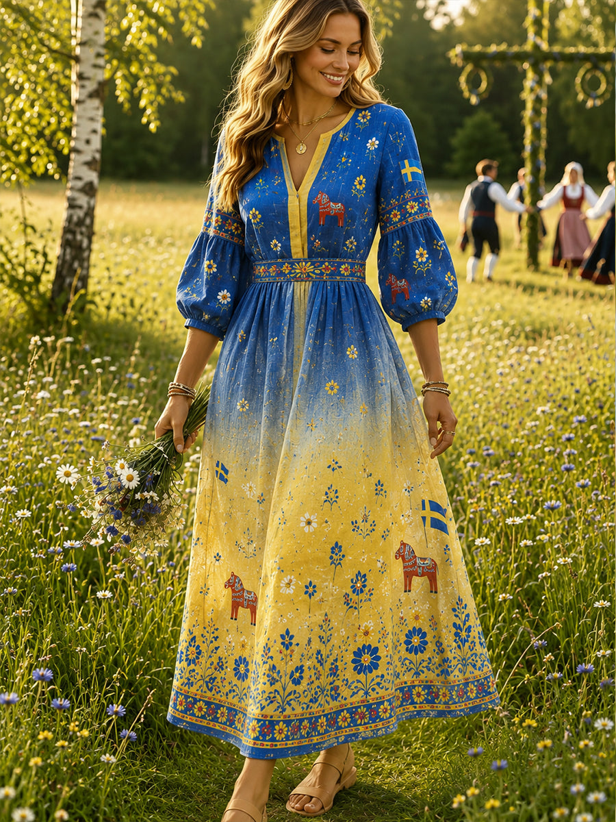 Dammens midsommarlängdsklänning med blommönster
