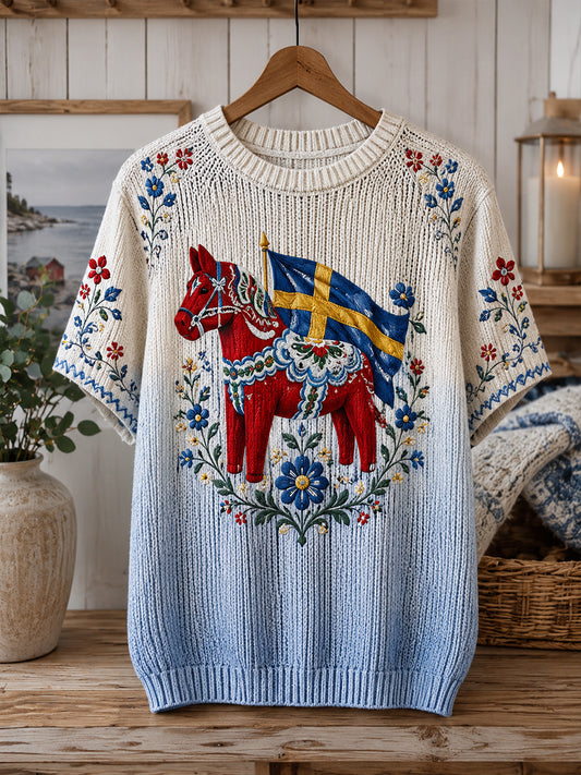 Dammens midsommartröja i stickat tyg med blommönster och korta ärmar