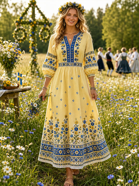 Dammens midsommarklänning med blommönster och v-ringning