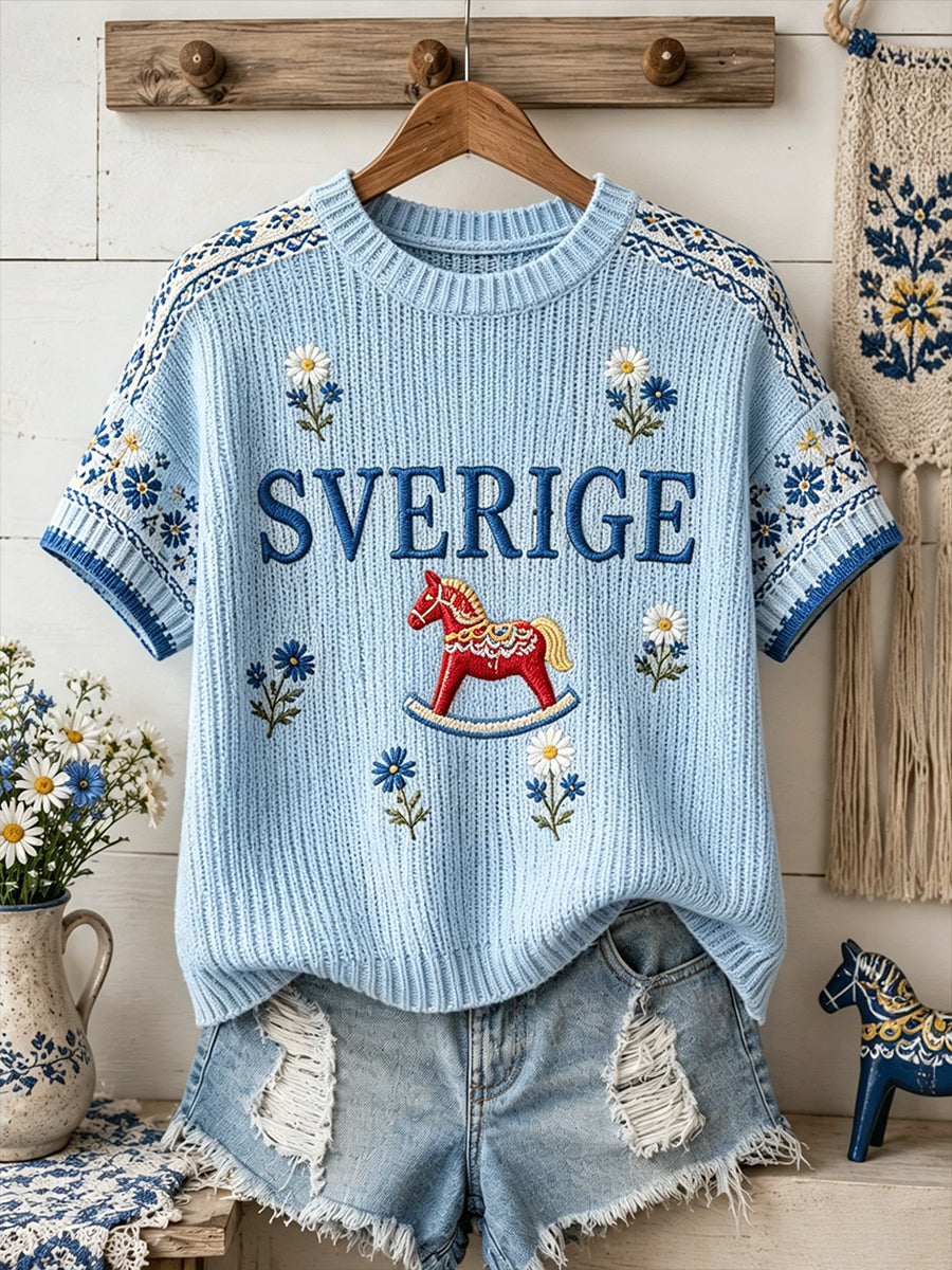 Dammens midsommartröja i stickat tyg med blommönster och korta ärmar