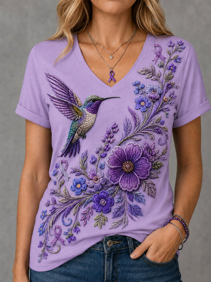 Kvinnors lila blommor & Hummingbird Skriv ut Alzheimers medvetenhet Stöd V-Neck Tee