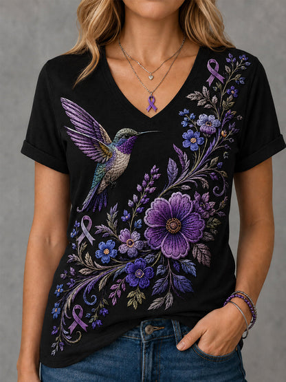 Kvinnors lila blommor & Hummingbird Skriv ut Alzheimers medvetenhet Stöd V-Neck Tee