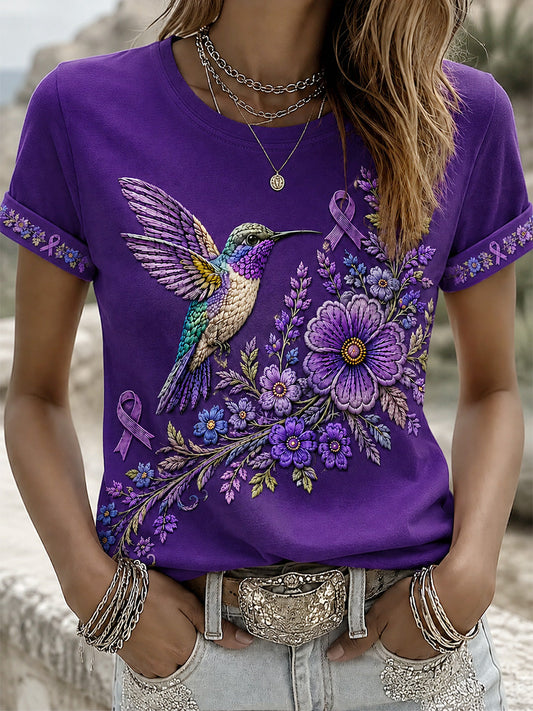 T-shirt för Alzheimers-medvetande med lila blommönster och kolibri, till stöd för drabbade kvinnor