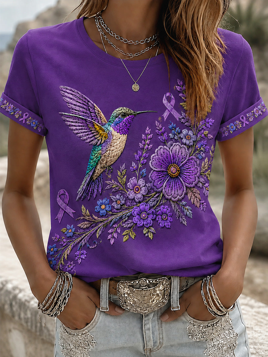 T-shirt för Alzheimers-medvetande med lila blommönster och kolibri, till stöd för drabbade kvinnor