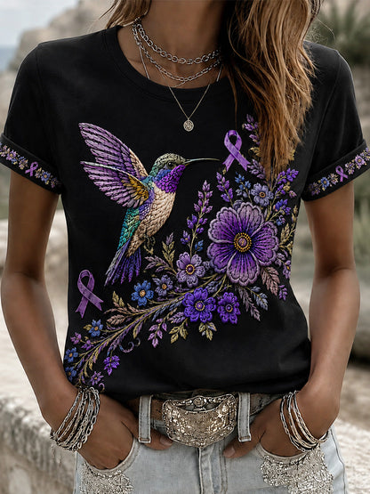 T-shirt för Alzheimers-medvetande med lila blommönster och kolibri, till stöd för drabbade kvinnor