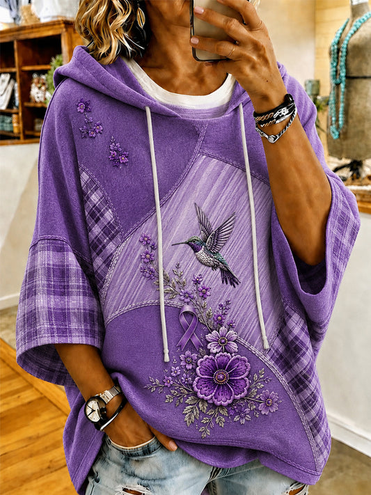 Dammuddning med lila blommor och kolibribild förmedlar medvetenhet om alzheimerssjukdom, kortärmad hoodie med lockdragsko