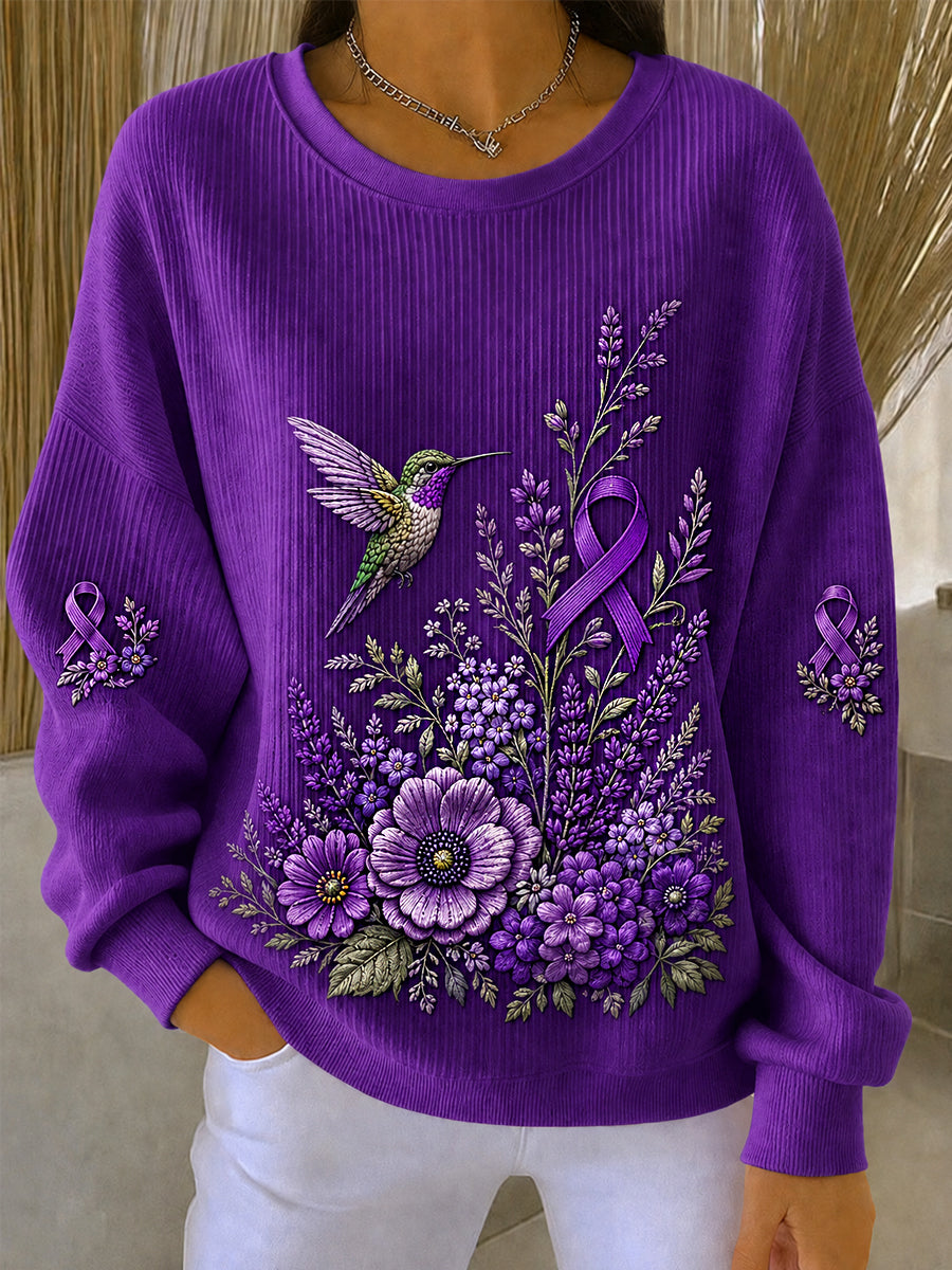 Dammuddning i lila med blommor och kolibri för att uppmärksamma Alzheimers sjukdom